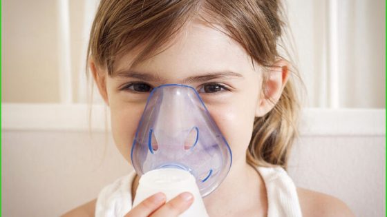"Young little girl using nebuliser to relieve the cough. Square framing, shallow depth of field, adobeRGB photo. Vignette added in postprocess."